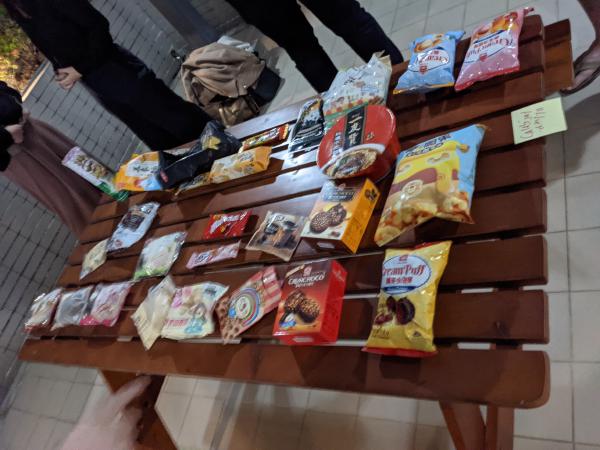Many of the snacks layed out on the table