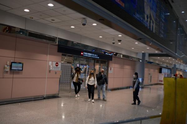 My family coming out of departure hall.