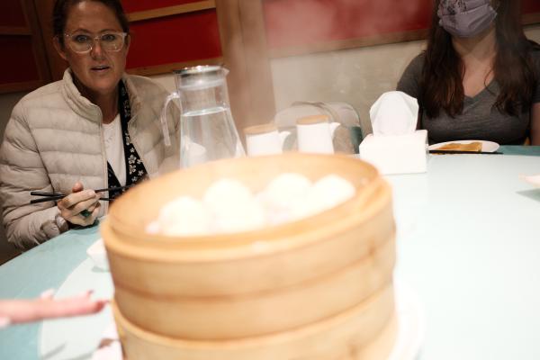 Mom and Colette looking at dumplings