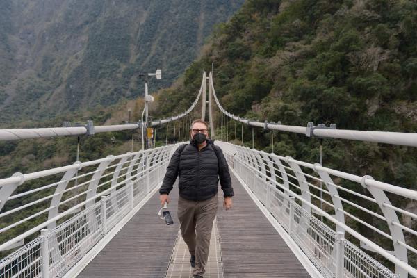 Dad on a pedestrian bridge in taroko
