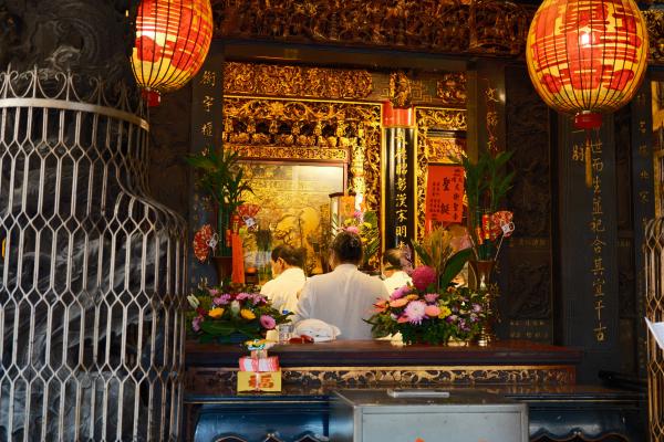 Some lady praying at a Taoist temple in Tainan