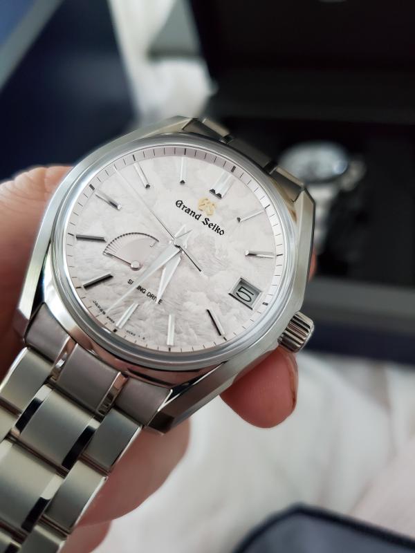 Grand Seiko SBGA413 in hand at Grand Seiko Boutique