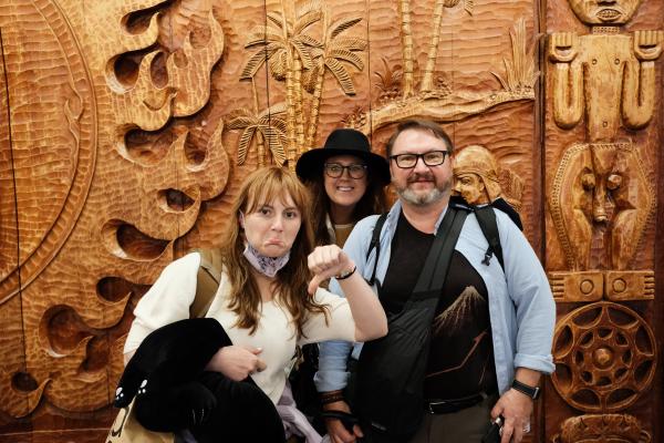 Mom, dad, and colette in front of the big dick art