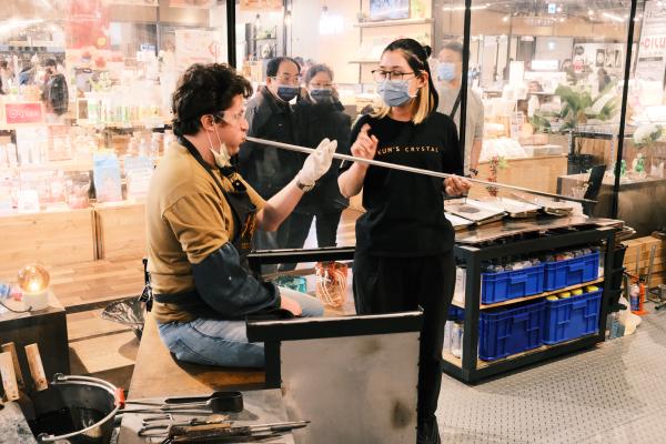 Caleb blowing glass