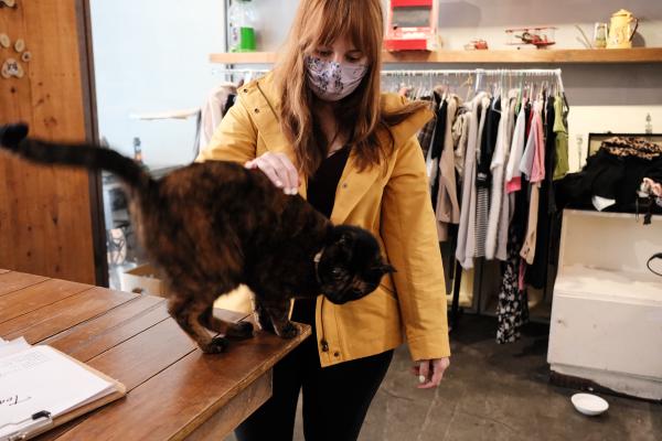 Colette petting a cat