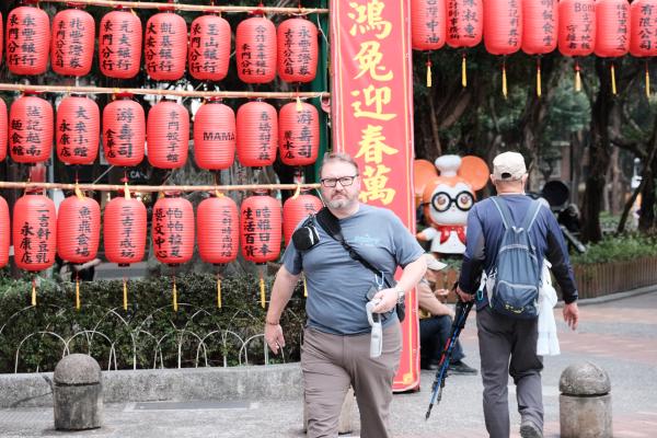 Dad in front of the lanterns at the park at dongmen