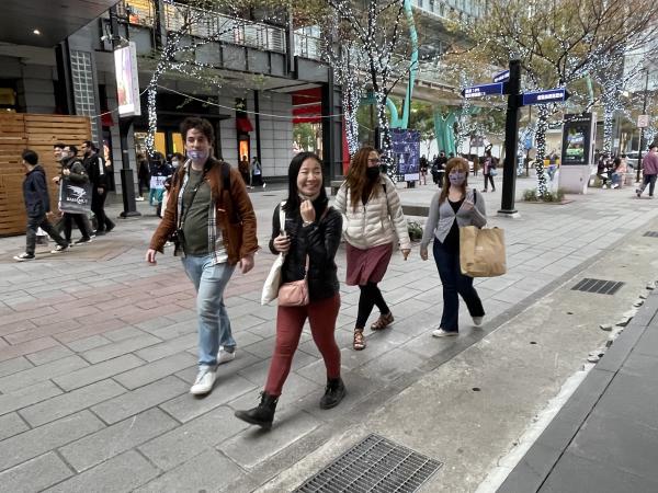 Family walking around Taipei City Hall