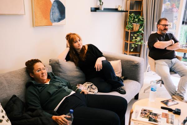 Family hanging out on the couch