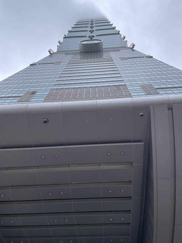 Taipei 101 from the bottom on a foggy day