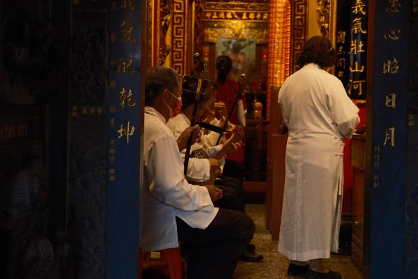 People playing instruments at a Taoist temple in Tainan