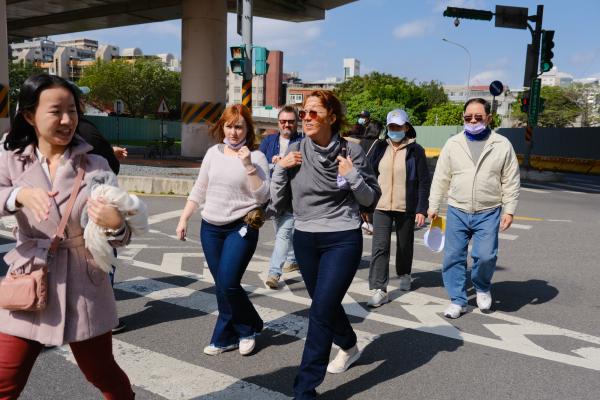 The family walking towards Songshan Cultural Creative Park