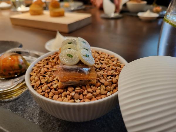 The first dish, with the spherical glass orb opened.