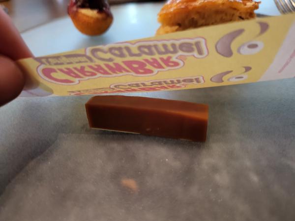 The caramel, under its paper