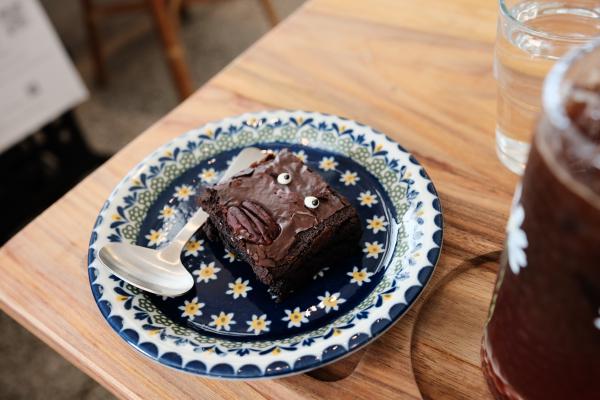 A brownie with googly eyes