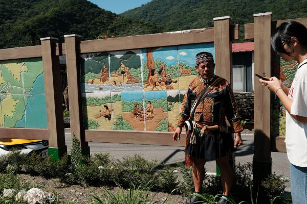 The tour guide teaching us about myths of the tribe