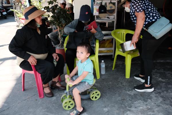 A kid on a toy car