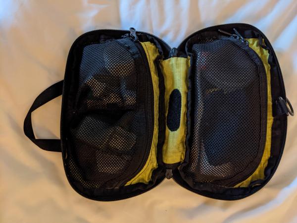 My bathroom bag, packed and displayed open.