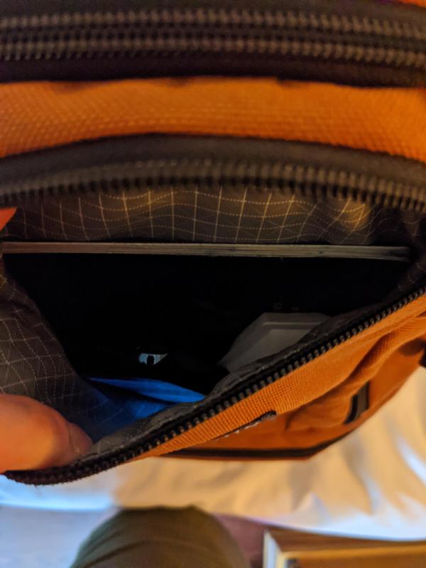My backpack's front front pocket, packed and open.