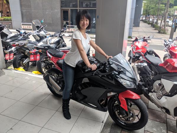 Tammy on her ninja at the rental shop in Taipei